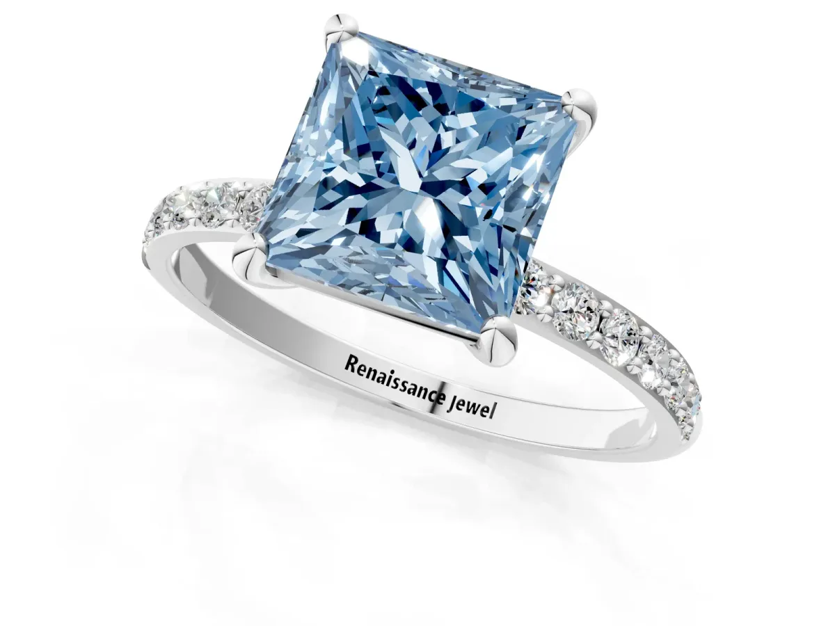 Fancy Blue Princess Cut Diamond Solitaire Ring with Round Pavé Band and Prong Setting Silver