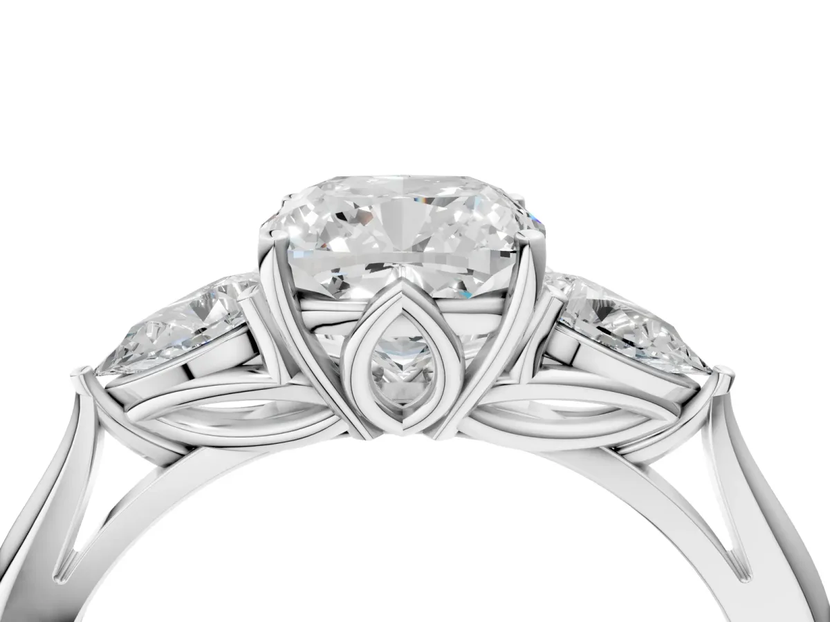 Three-Stone Cushion Cut Diamond Ring with Pear Side Stones in Four-Prong Setting White gold