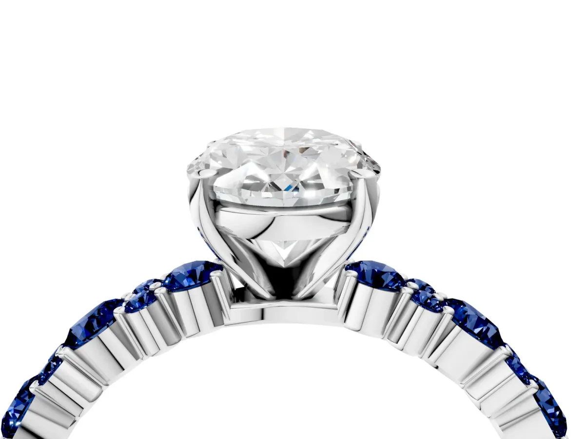 Oval Cut Diamond Side Stone Solitaire Ring with Round Blue Sapphire and Four-Prong Setting Platinum
