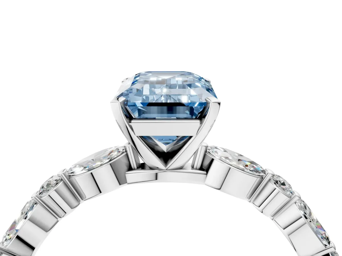 Fancy Blue Emerald Cut Diamond Ring with Marquise and Round Side Stones and Four-Prong Setting Silver
