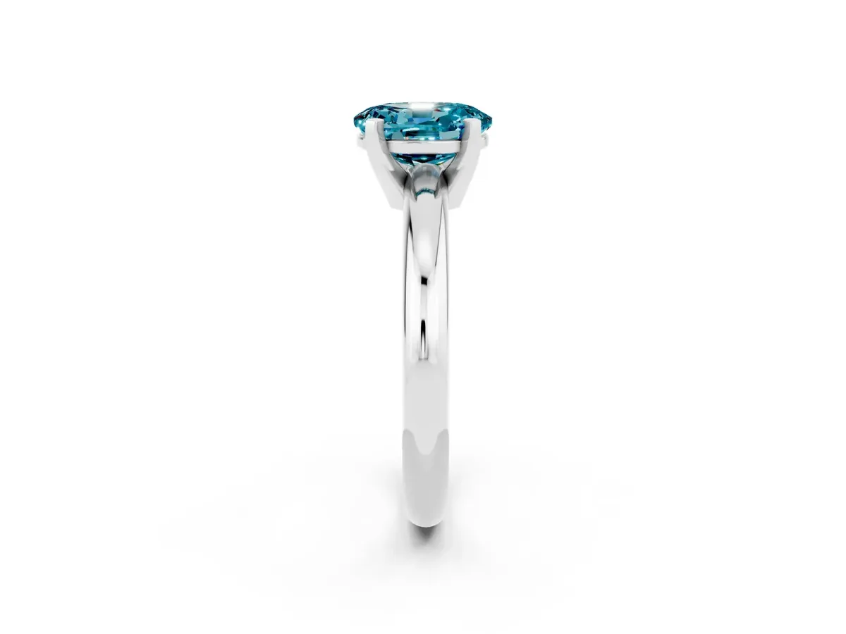 Oval Cut Blue Topaz Solitaire Engagement Ring with Round Band and Four-Prong Setting Silver