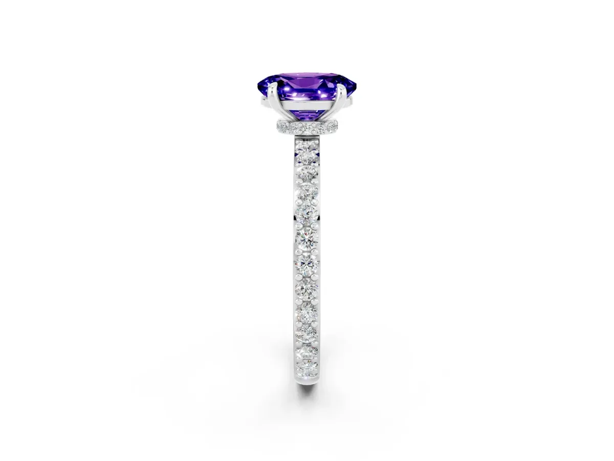 Oval Cut Tanzanite Solitaire Engagement Ring with Pavé Band and Four-Prong Setting Silver