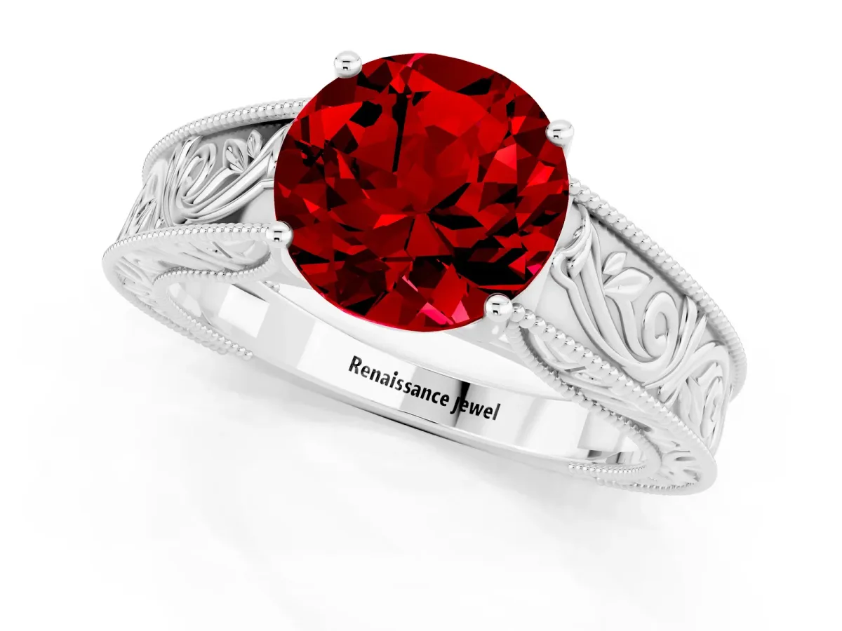 Round Cut Ruby Solitaire Ring with Engraved Band and Four-Prong Setting White gold