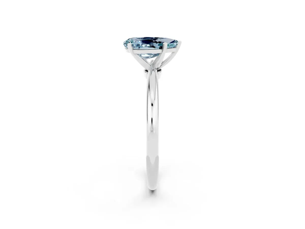 Pear Cut Aquamarine Solitaire Ring with Six-Prong Setting and Classic Band Silver