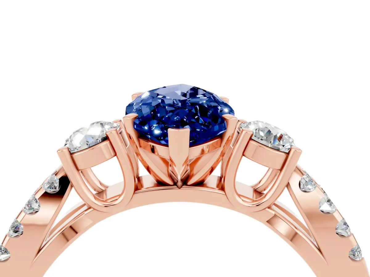 Marquise Cut Blue Sapphire Three-Stone Ring with Pavé Split Shank and Four-Prong Setting Rose gold
