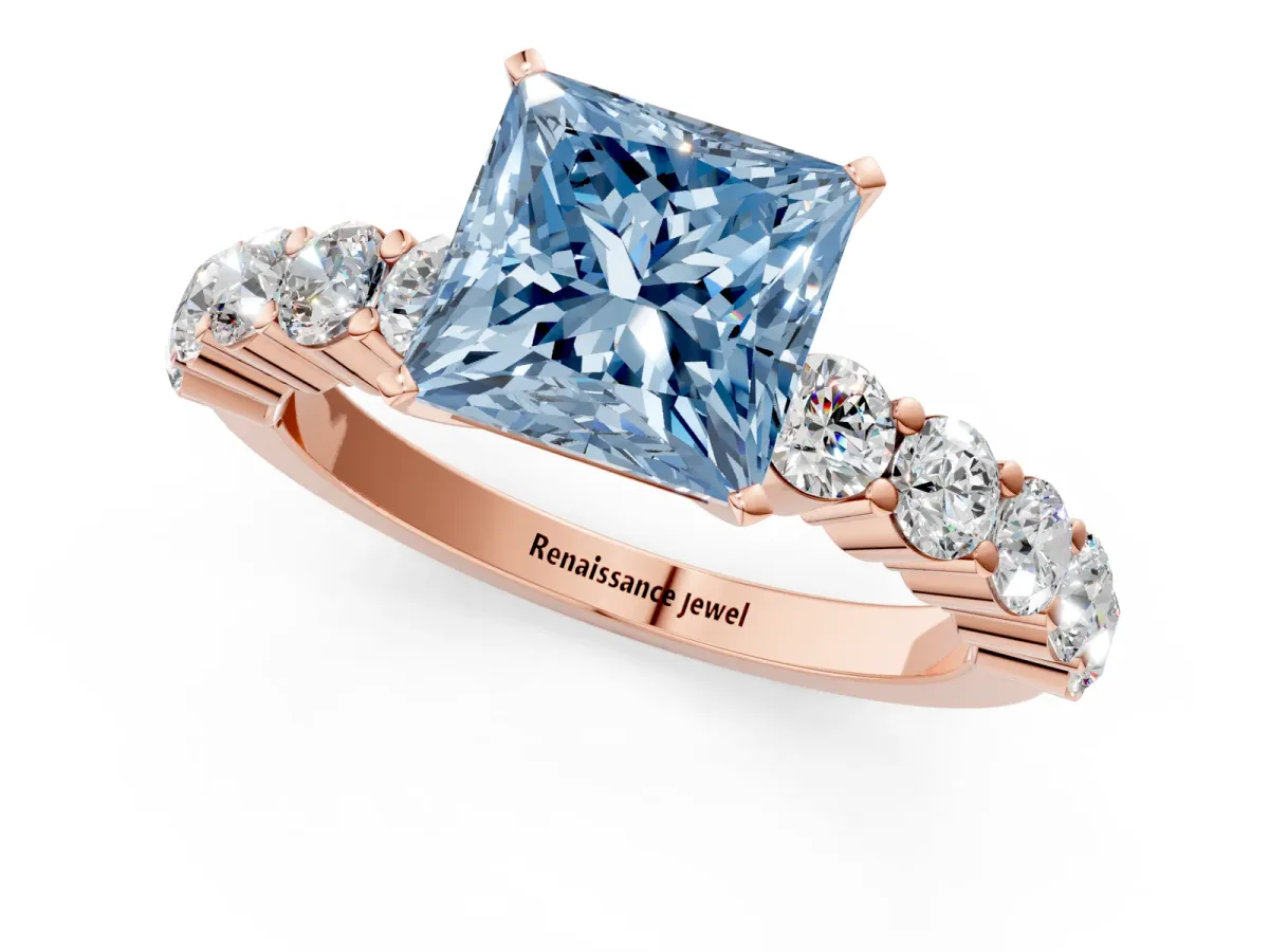 Fancy Blue Princess Cut Diamond Solitaire Ring with Shared Prong Round Side Stones Rose gold