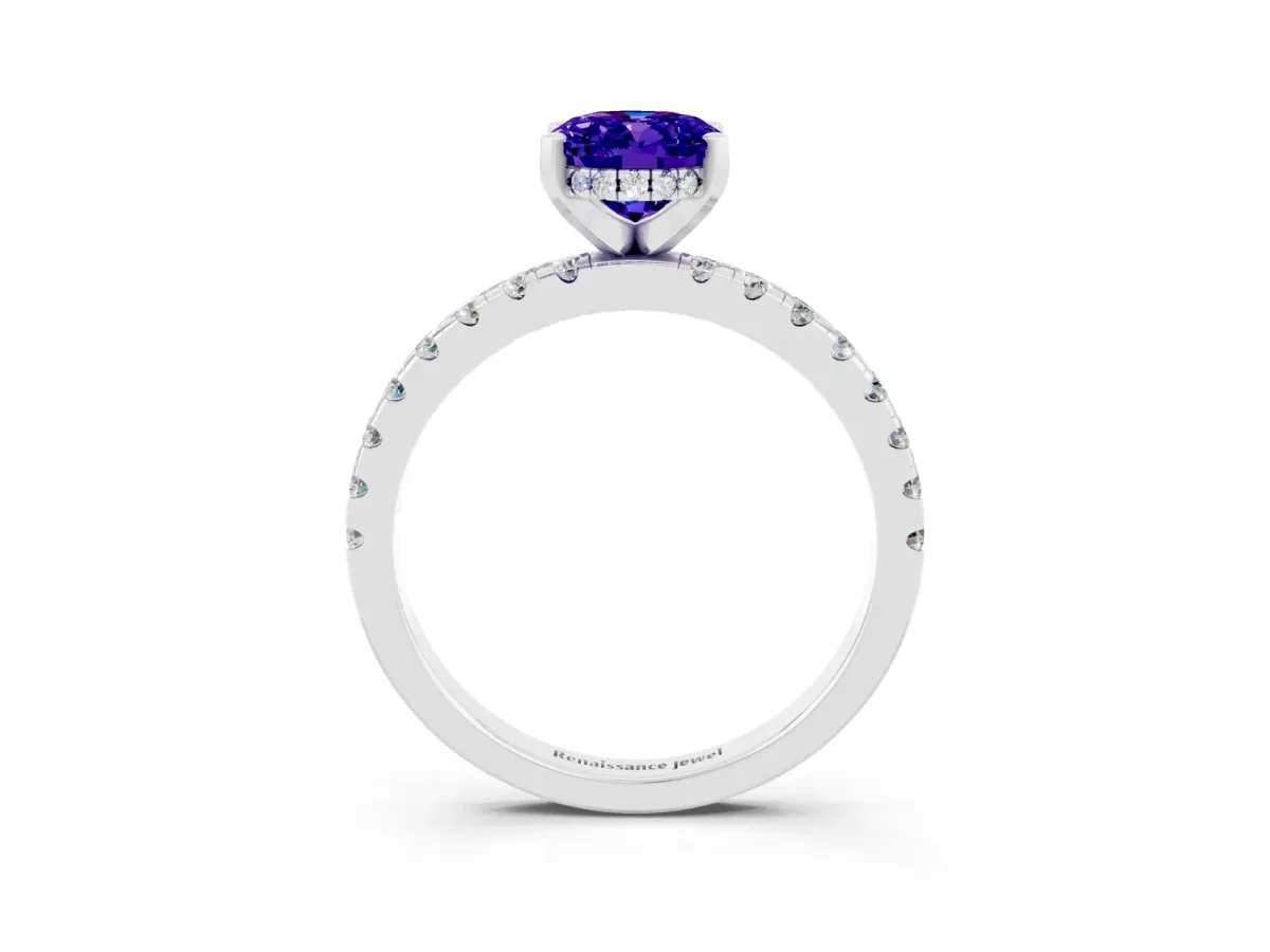 Oval Cut Tanzanite Solitaire Ring with Round Pavé Band and Four-Prong Setting Silver