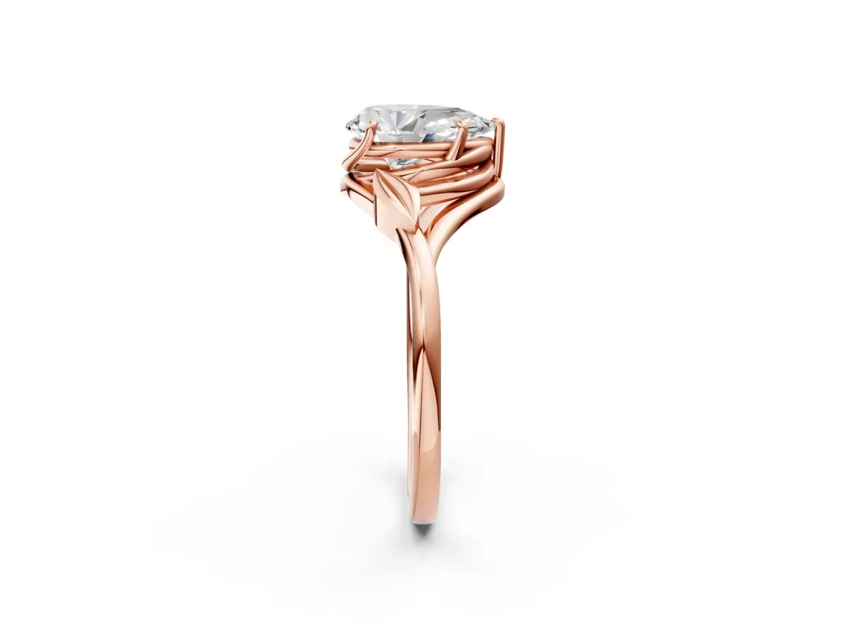 Pear Cut Diamond Solitaire Ring with Twist Band and Four-Prong Setting Rose gold