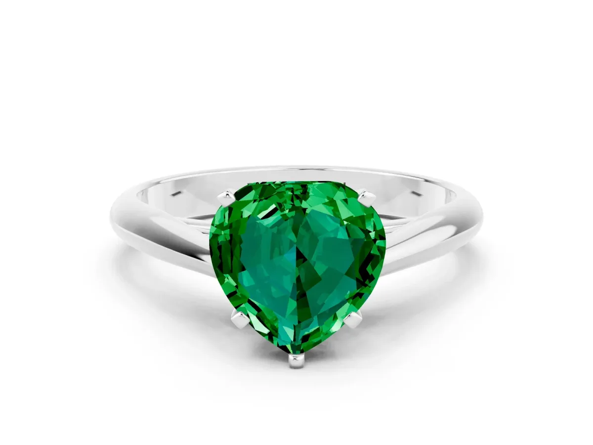 Heart Cut Emerald Solitaire Engagement Ring with Cathedral Setting and Four-Prong Mount White gold