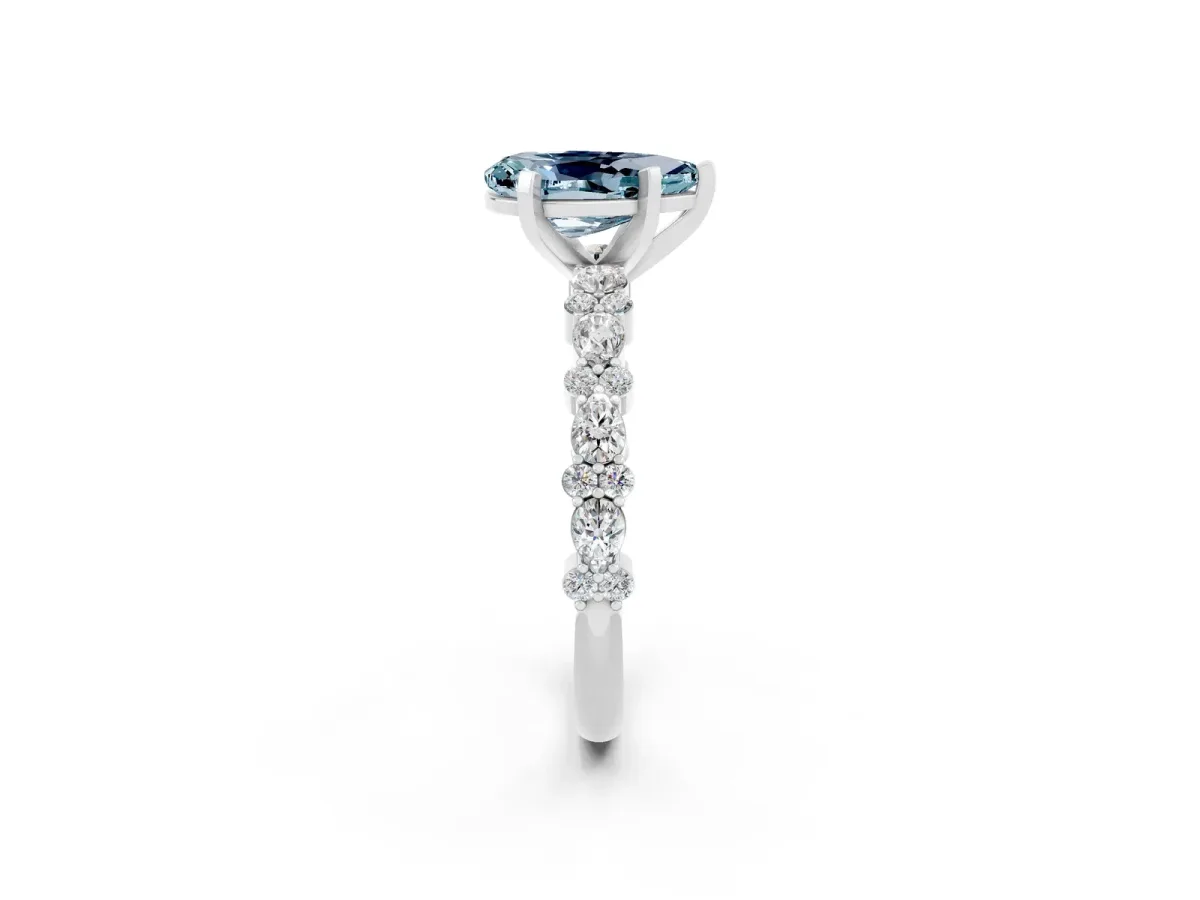 Pear Cut Aquamarine Side Stone Solitaire Ring with Round and Four-Prong Setting Silver