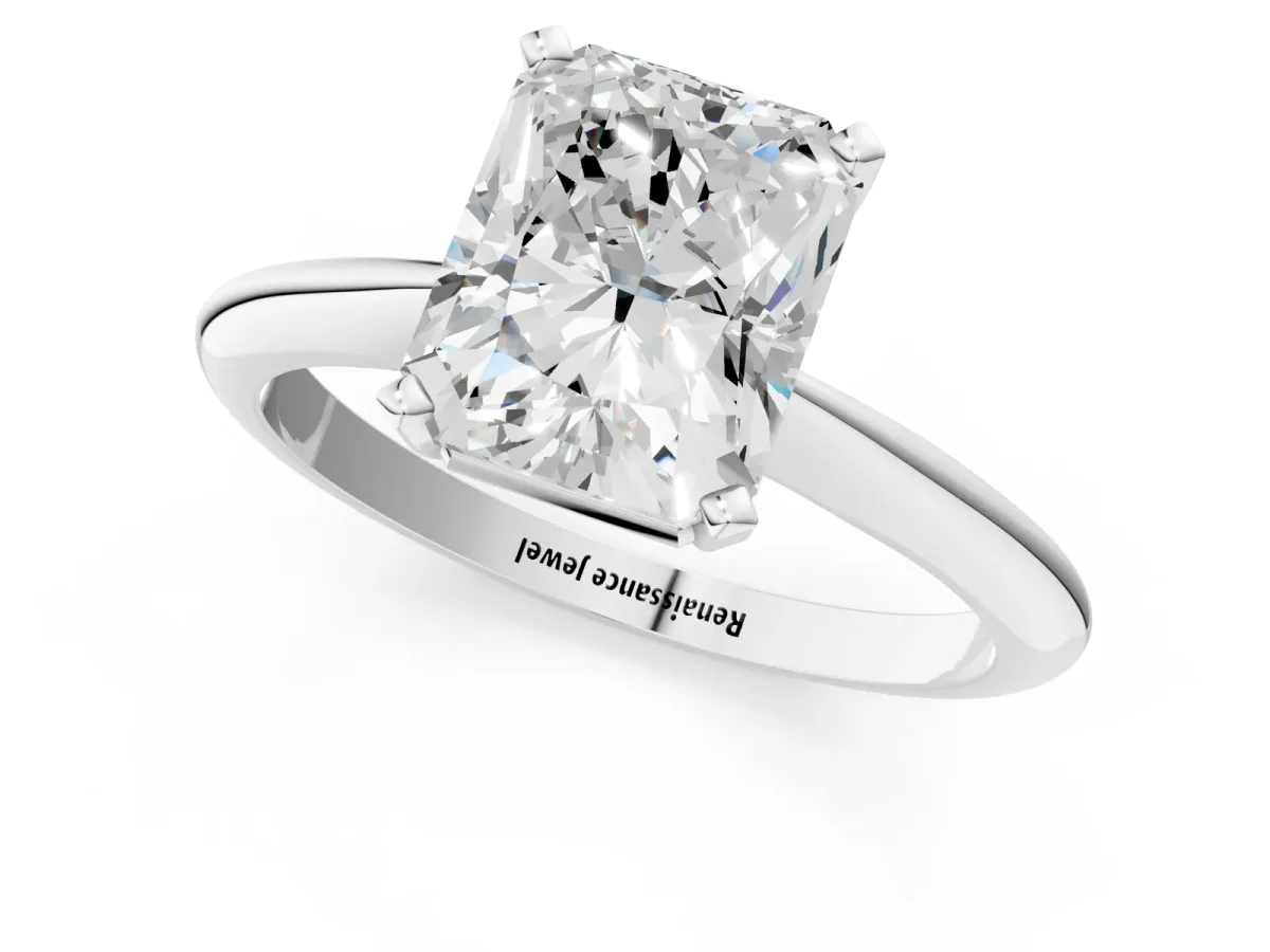 Radiant Cut Cut Solitaire Ring with Four-Prong Setting on a Classic Band Platinum