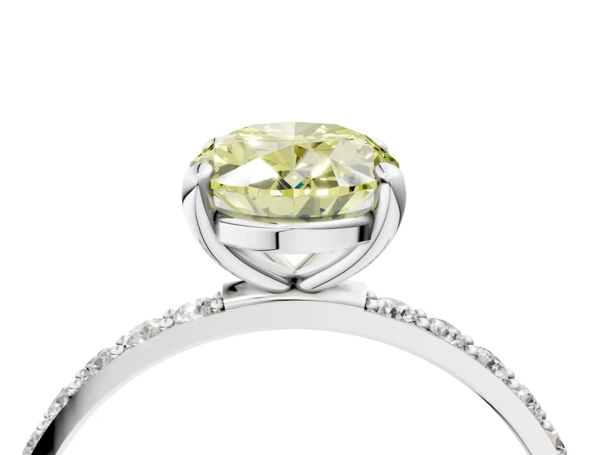Fancy Yellow Oval Cut Diamond Solitaire Ring with Round Pavé Band and Prong Setting Silver