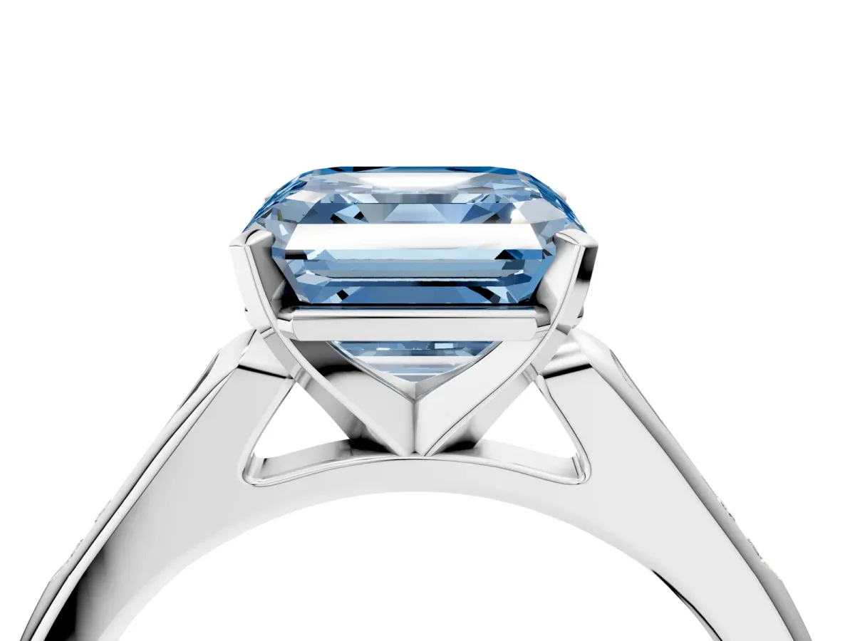 Fancy Blue Asscher Cut Diamond Solitaire Ring with Channel Set Round Band and Prong Setting Silver