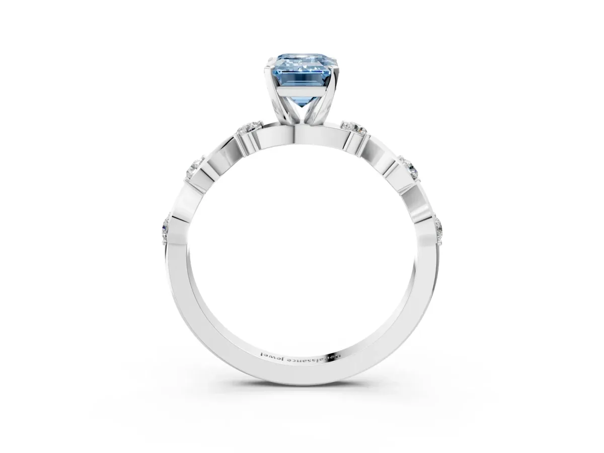 Fancy Blue Emerald Cut Diamond Solitaire Twisted Band with Round Accents and Prong Setting Silver