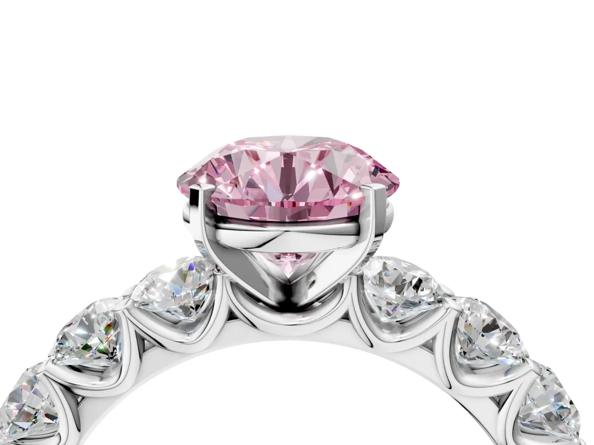 Fancy Pink Round Cut Diamond Prong Setting with Side Stones on a Pave Band Silver