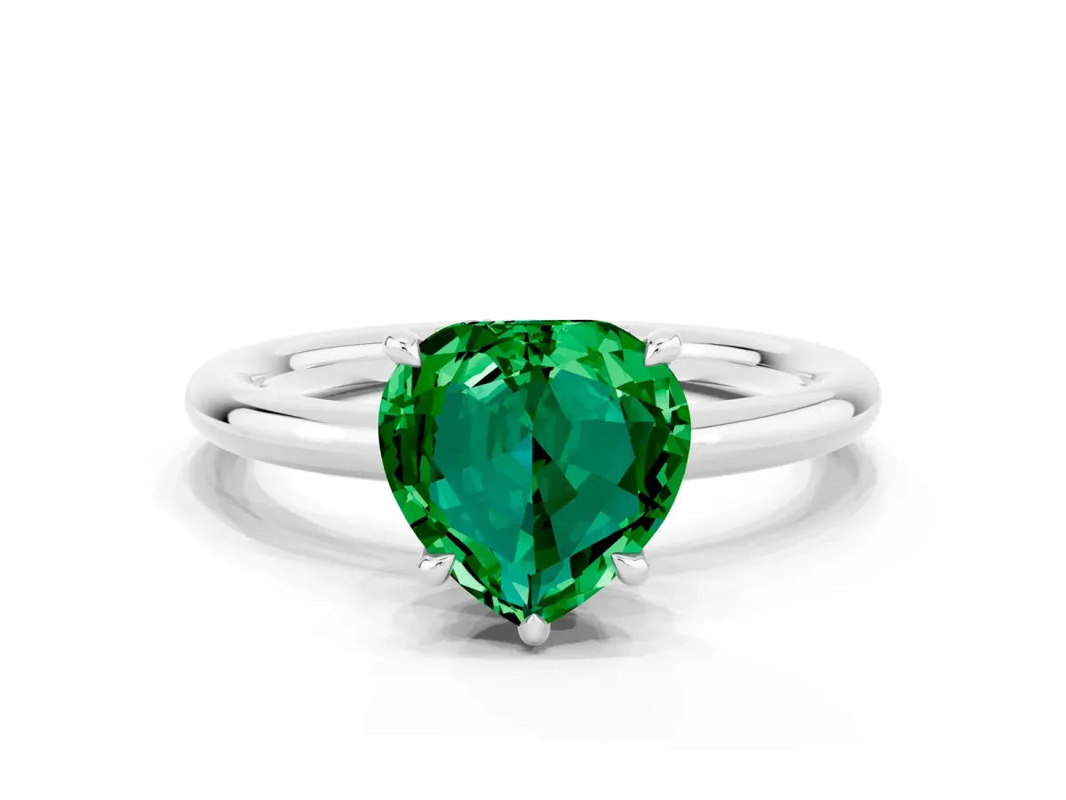 Heart Cut Emerald Solitaire Ring with Thin Band and Four-Prong Setting White gold