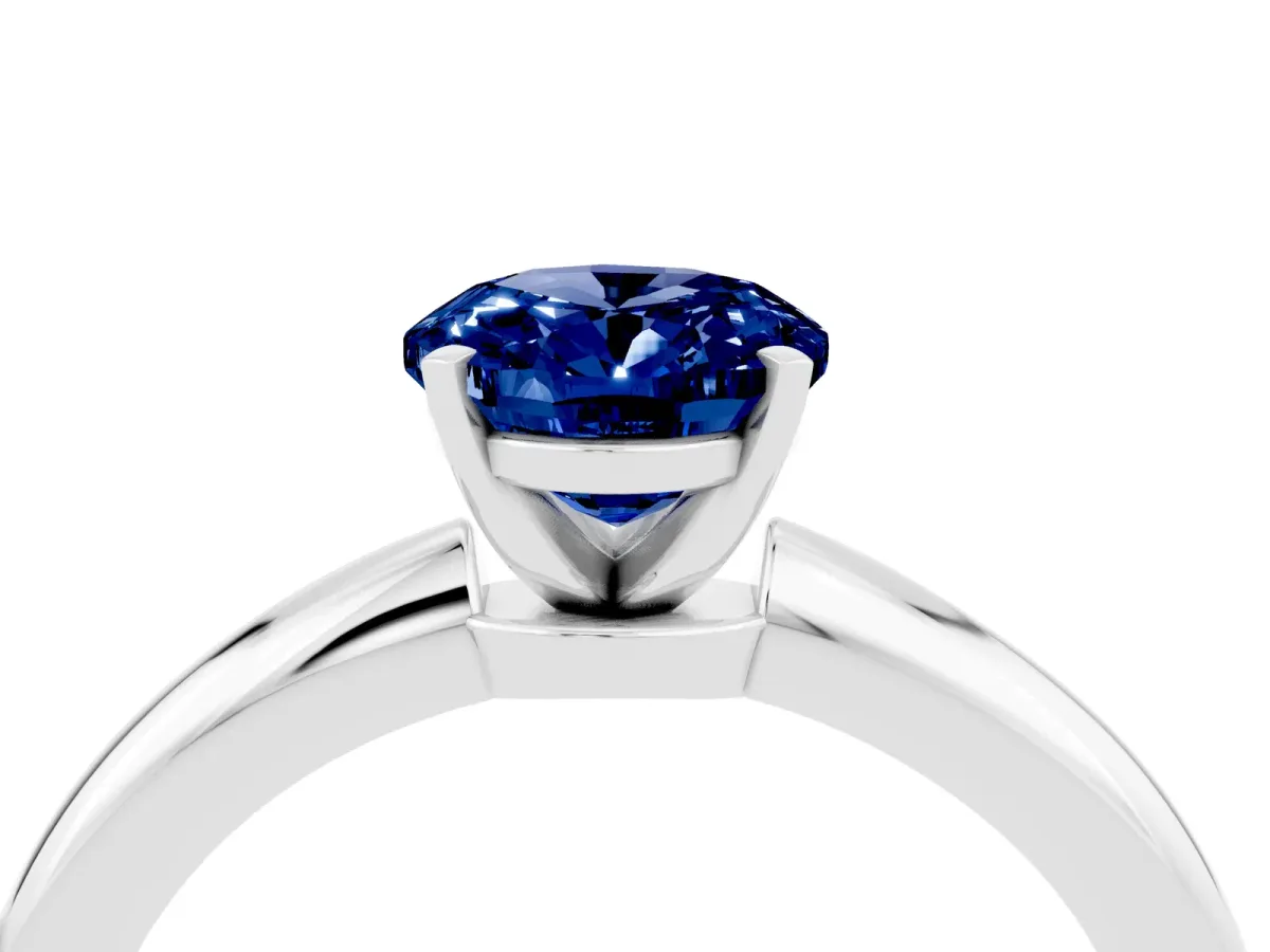 Oval Cut Blue Sapphire Solitaire Ring with Six-Prong Setting and Classic Band Silver