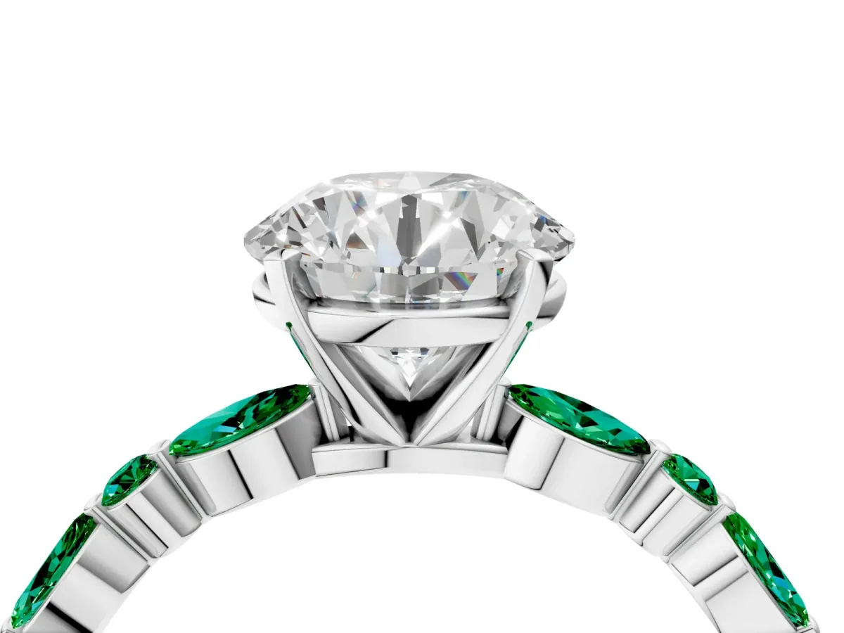 Round Cut Diamond Ring with Marquise and Round Emerald Side Stones and Four-Prong Setting Silver