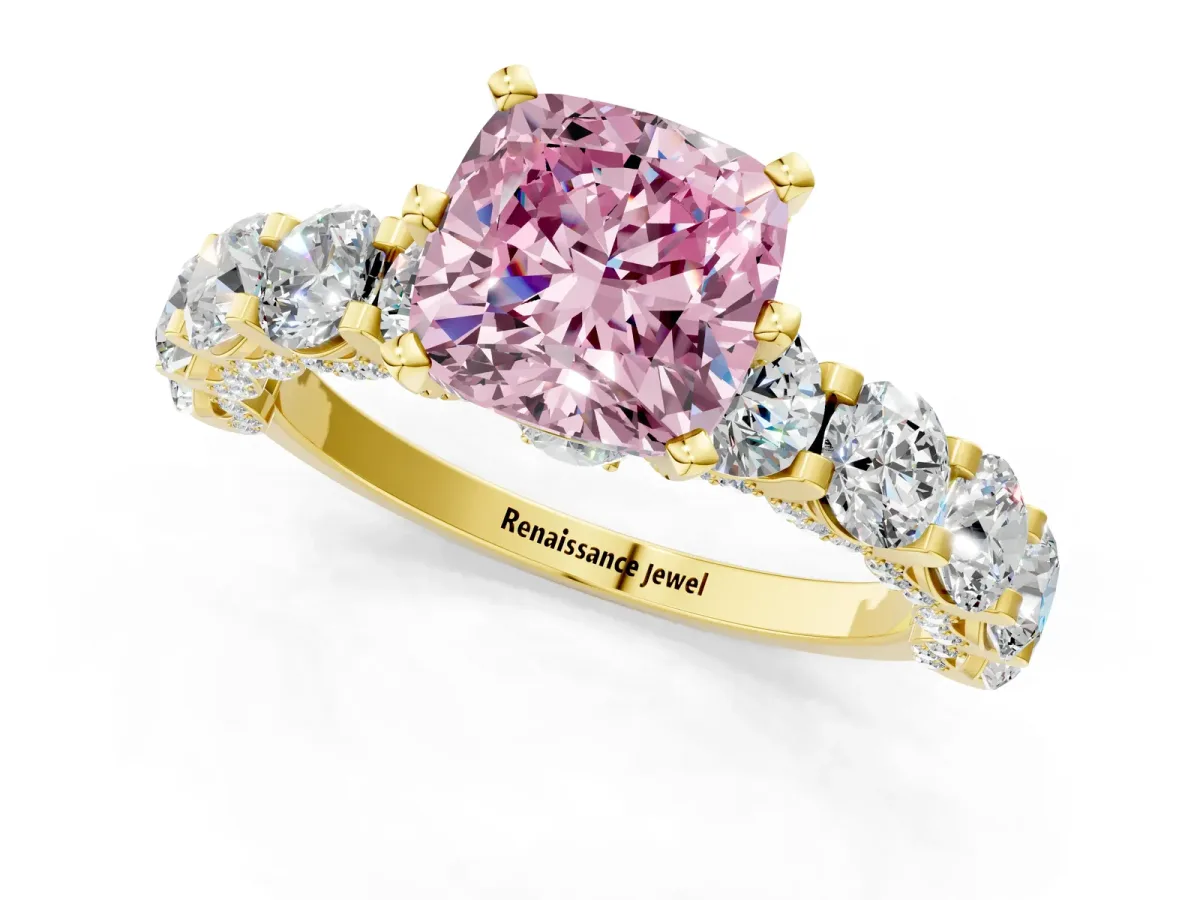 Fancy Pink Cushion Cut Diamond Side Stone Engagement Ring with Four-Prong Setting Yellow gold