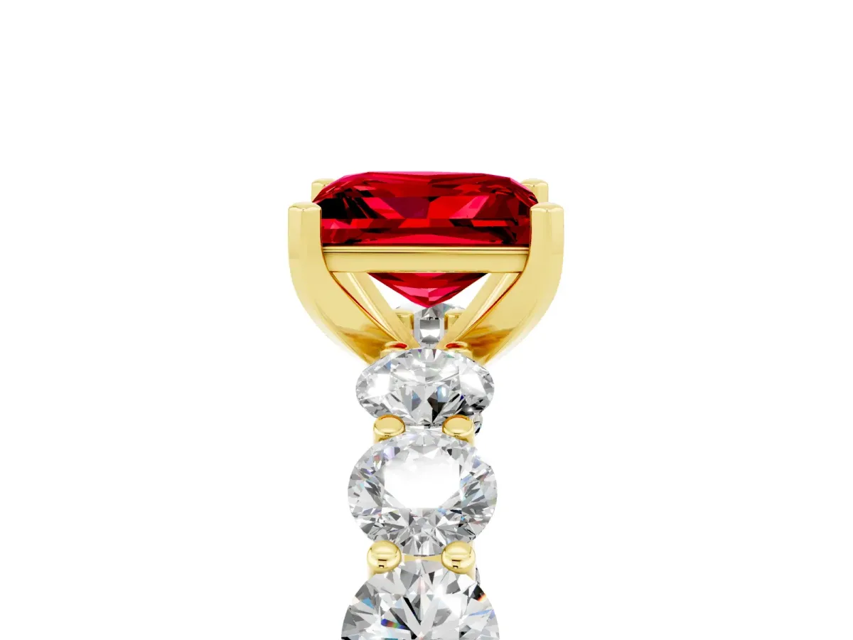 Princess Cut Ruby Prong Setting with Side Stones on a Pave Band Yellow gold
