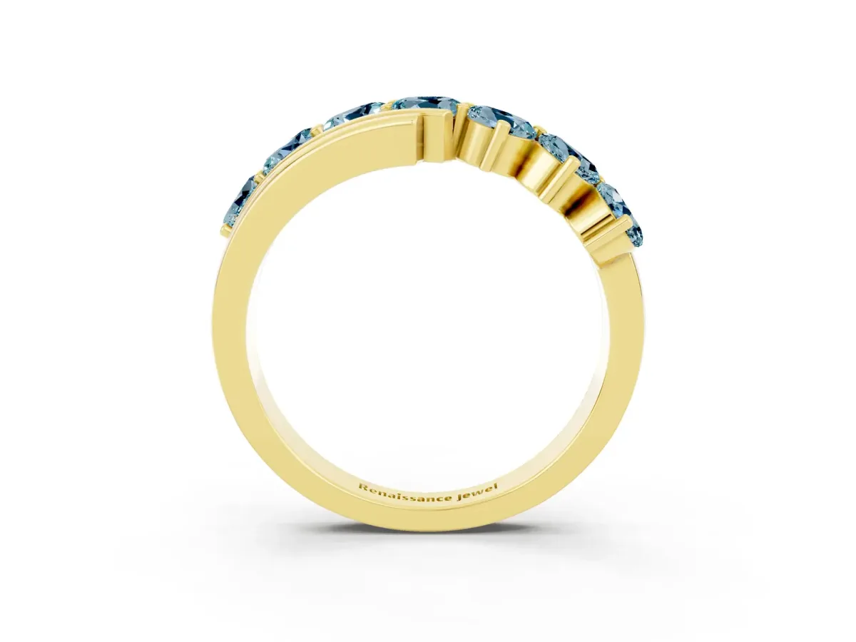 Round Aquamarine Wave Band with Channel and Shared Prong Setting Yellow gold