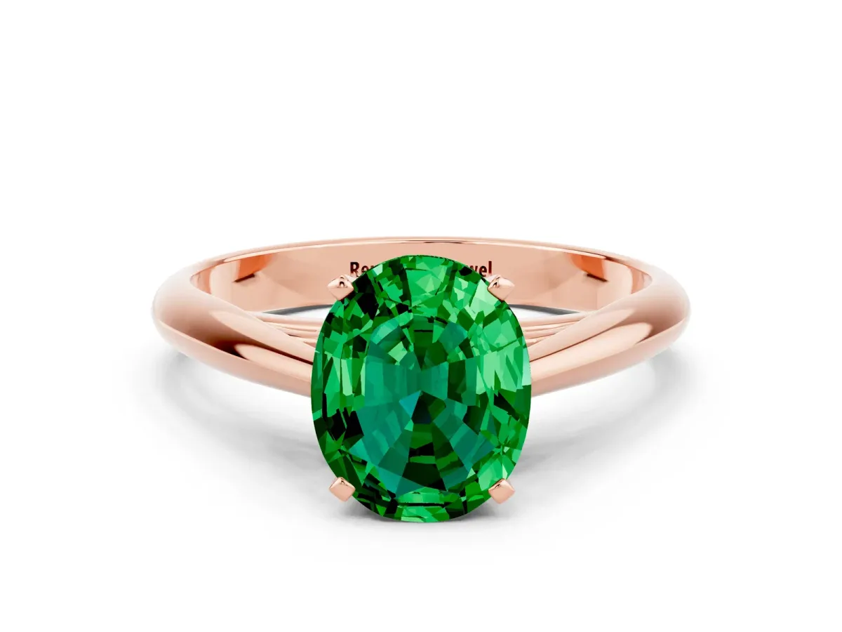 Oval Cut Emerald Solitaire Engagement Ring with Cathedral Setting and Four-Prong Mount Rose gold