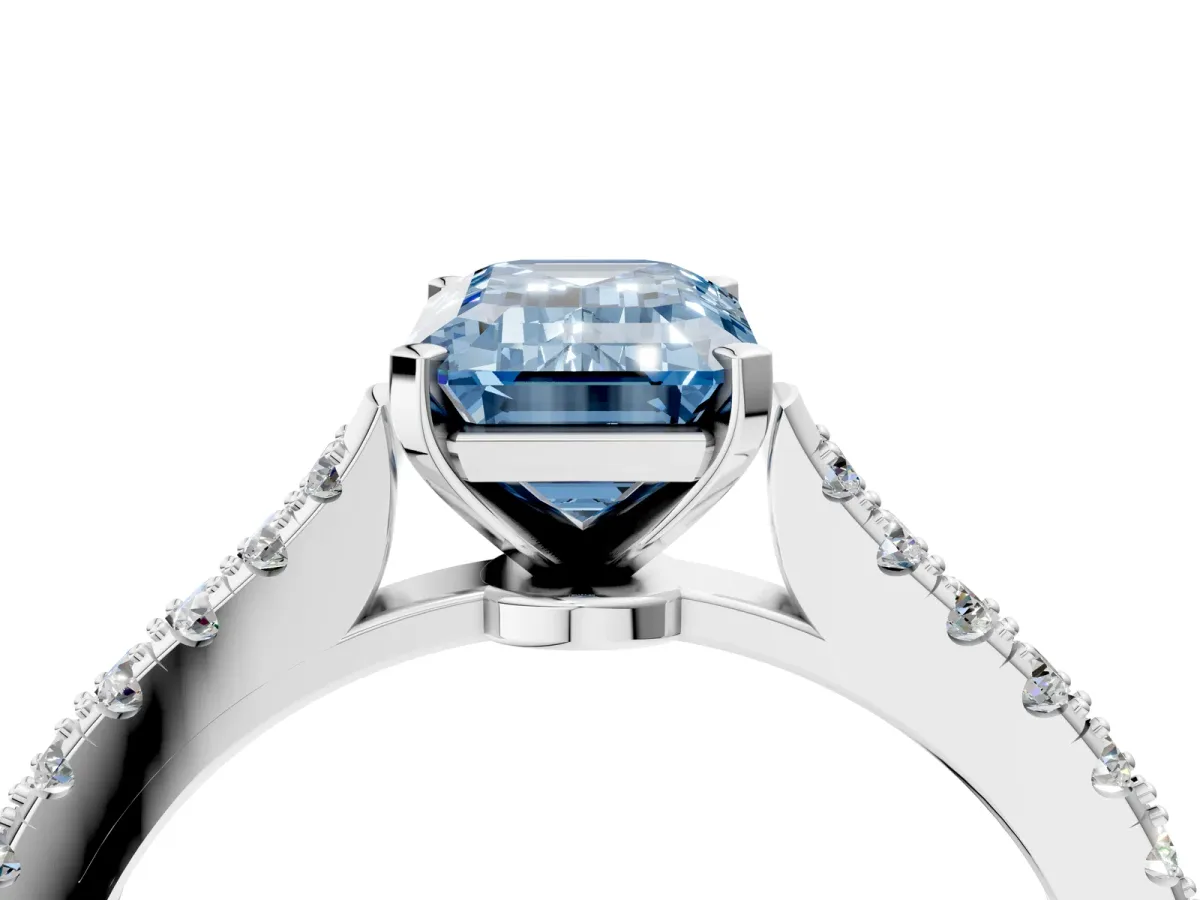 Fancy Blue Emerald Cut Cut Solitaire Diamond Engagement Ring with Pave Band and Four-Prong Setting Silver