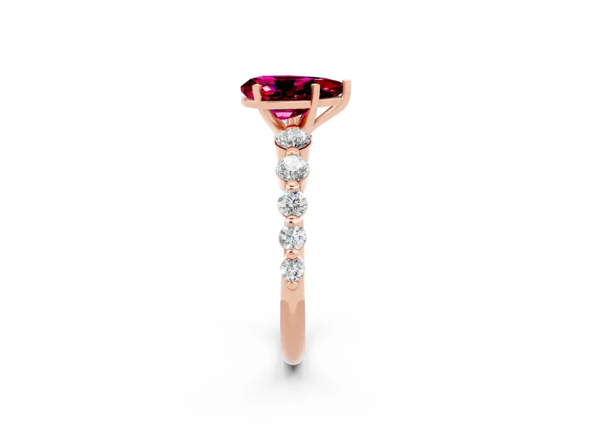Pear Cut Solitaire Garnet Ring with Pave Band and Four-Prong Setting Rose gold