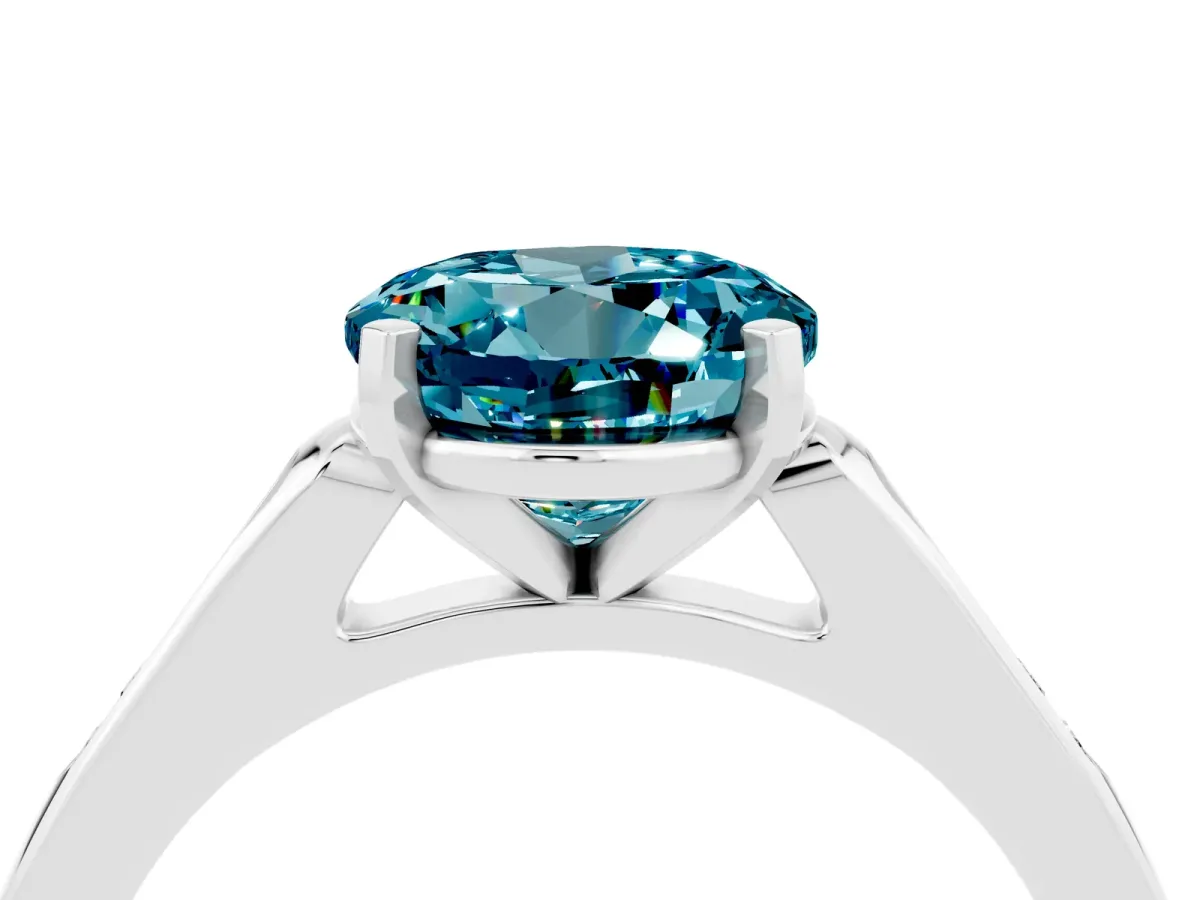 Round Cut Blue Topaz Solitaire Ring with Channel Set Round Band and Prong Setting Silver