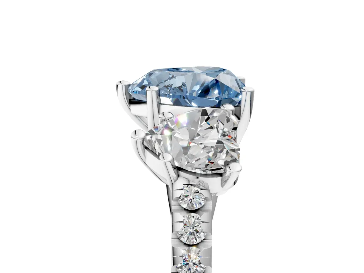 Fancy Blue Three-Stone Heart Cut Diamond Ring with Round Pavé Band and Prong Setting Silver