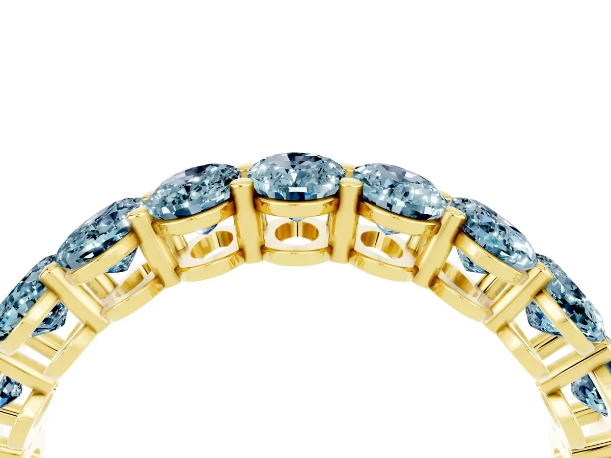Oval Cut Aquamarine Eternity Band with Shared Prong Setting Yellow gold