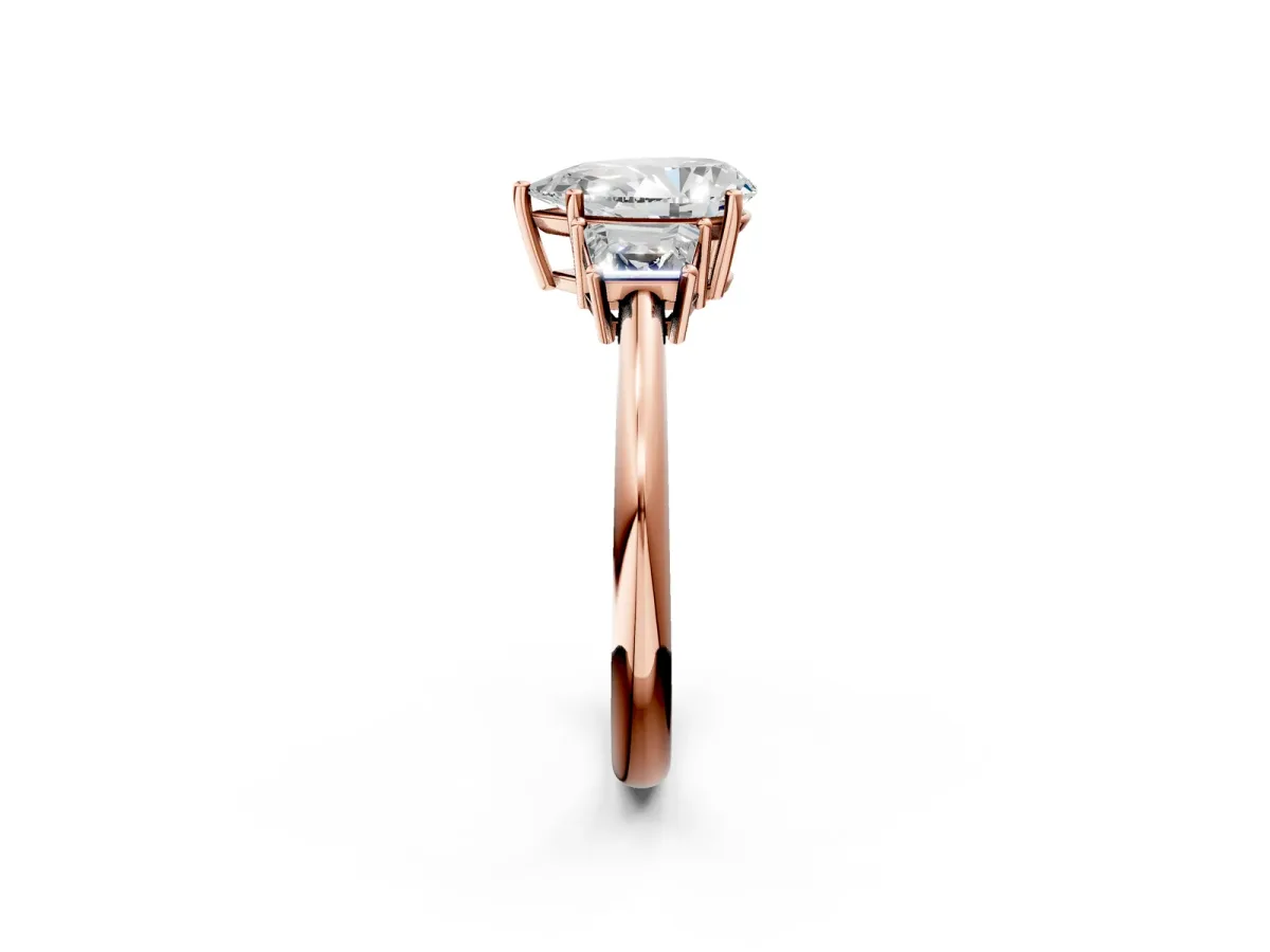 Pear Cut Diamond Three-Stone Ring with Trapezoid Side Stones and Prong Setting Rose gold