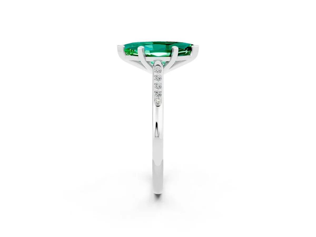 Marquise Cut Emerald Solitaire Ring with Channel Set Round Band and Prong Setting Silver