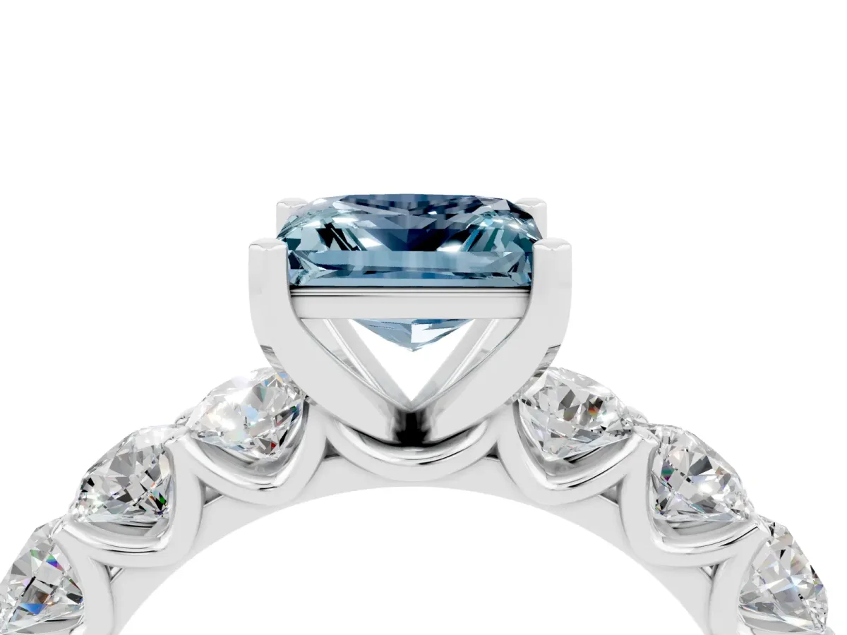 Princess Cut Aquamarine Prong Setting with Side Stones on a Pave Band Silver