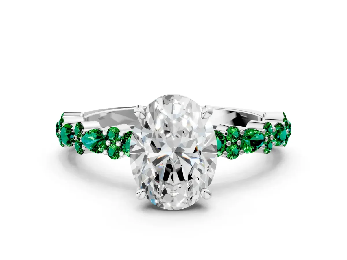 Oval Cut Diamond Side Stone Solitaire Ring with Round Emerald and Four-Prong Setting White gold