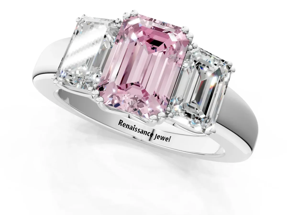 Fancy Pink Three-Stone Emerald Cut Cut Diamond Ring with Channel Set Band and Four-Prong Setting Platinum