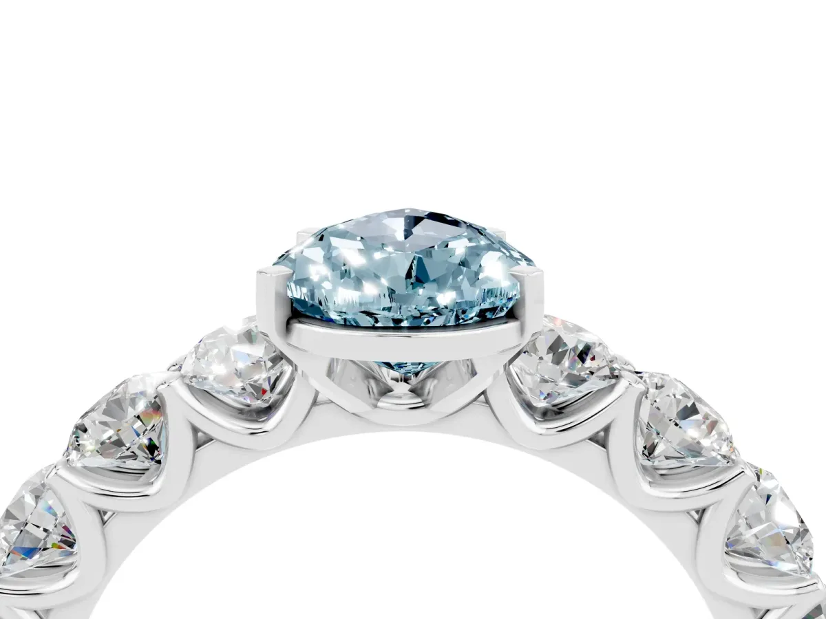 Pear Cut Aquamarine Prong Setting with Side Stones on a Pave Band Silver