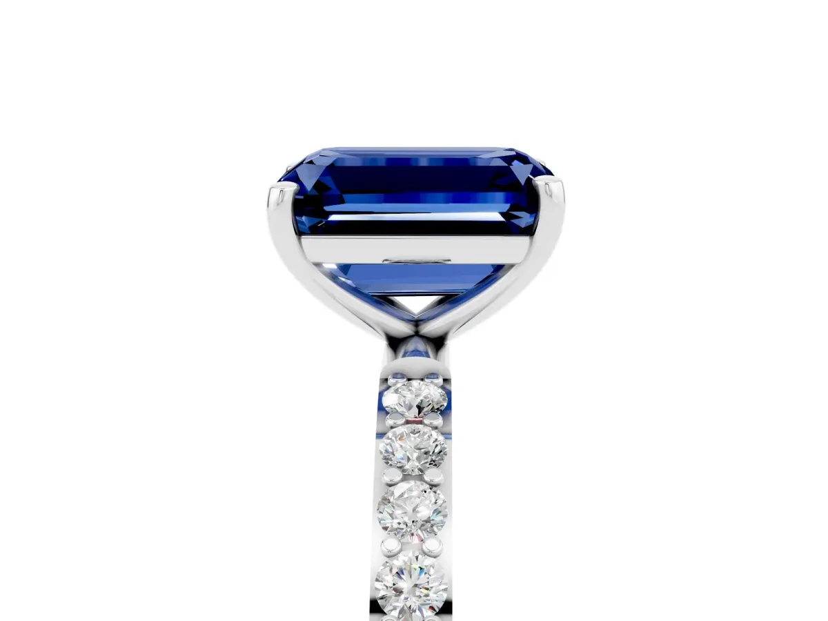 Emerald Cut Blue Sapphire Solitaire Ring with Round Pavé Band and Prong Setting Silver