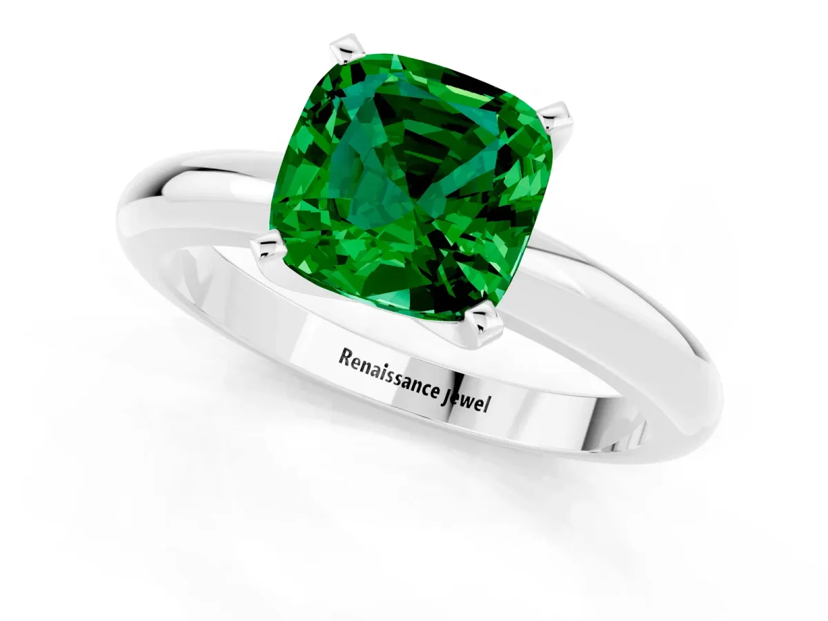 Cushion Cut Emerald Solitaire Engagement Ring with Round Band and Four-Prong Setting Silver
