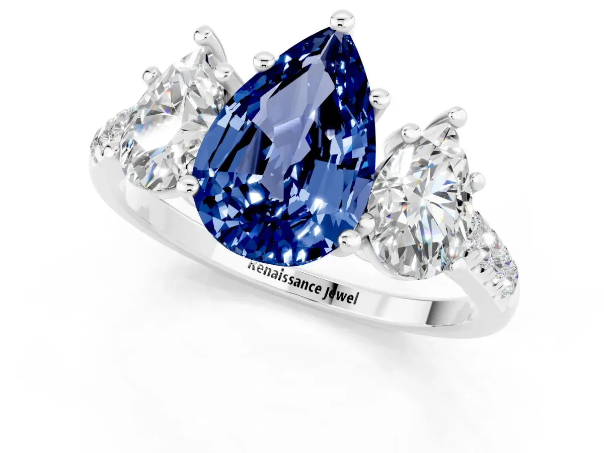 Three-Stone Pear Cut Blue Sapphire Ring with Round Pavé Band and Prong Setting Silver