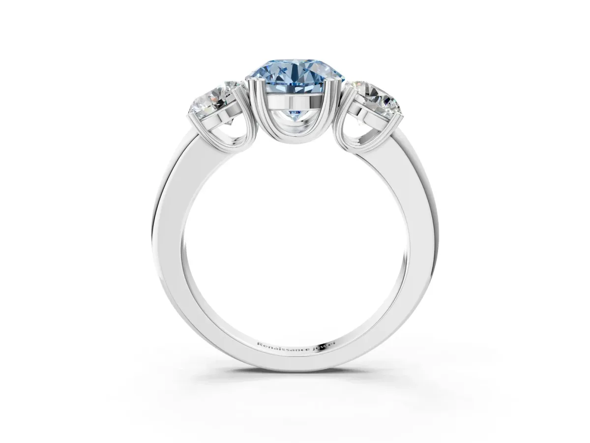 Fancy Blue Three-Stone Round Cut Cut Diamond Ring with Channel Set Band and Four-Prong Setting Silver