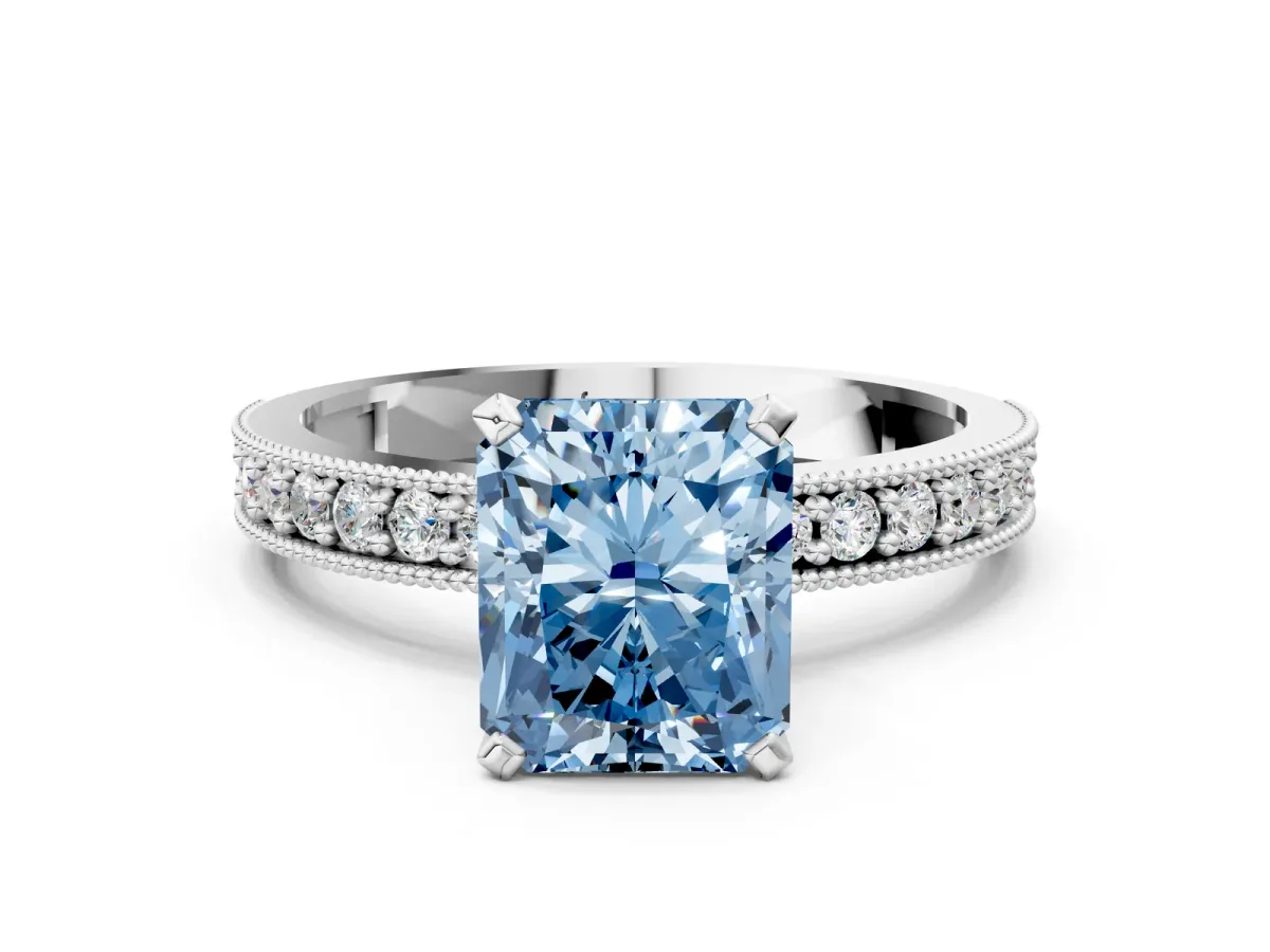 Fancy Blue Radiant Cut Diamond Milgrain Pavé Engagement Ring with Four-Prong Setting Platinum