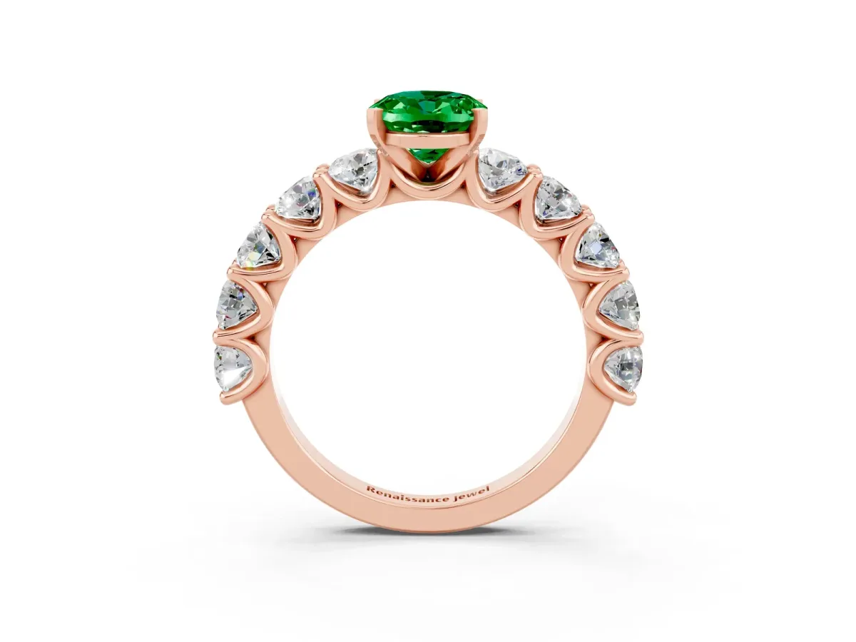 Oval Cut Emerald Prong Setting with Side Stones on a Pave Band Rose gold