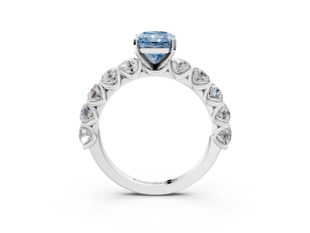 Fancy Blue Radiant Cut Diamond Prong Setting with Side Stones on a Pave Band Silver