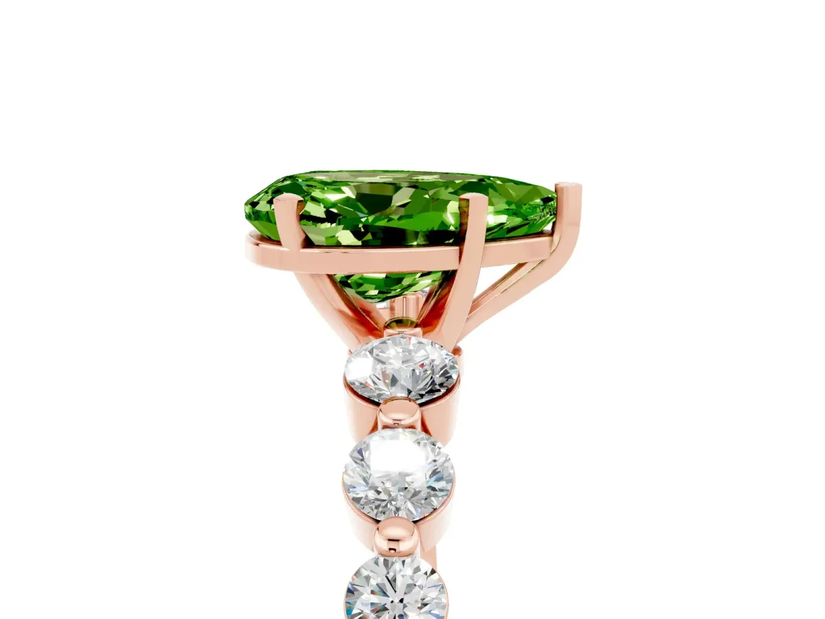 Pear Cut Solitaire Peridot Ring with Pave Band and Four-Prong Setting Rose gold