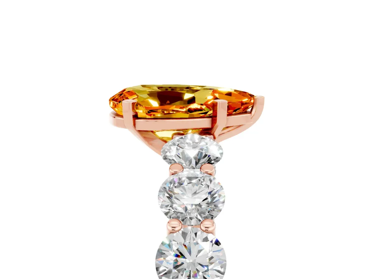 Pear Cut Citrine Prong Setting with Side Stones on a Pave Band Rose gold