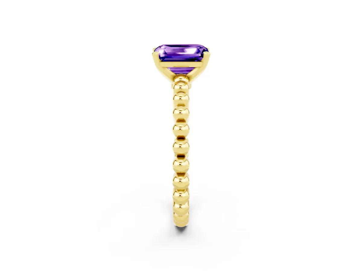 Emerald Cut Tanzanite Solitaire Ring with Beaded Band and Prong Setting Yellow gold