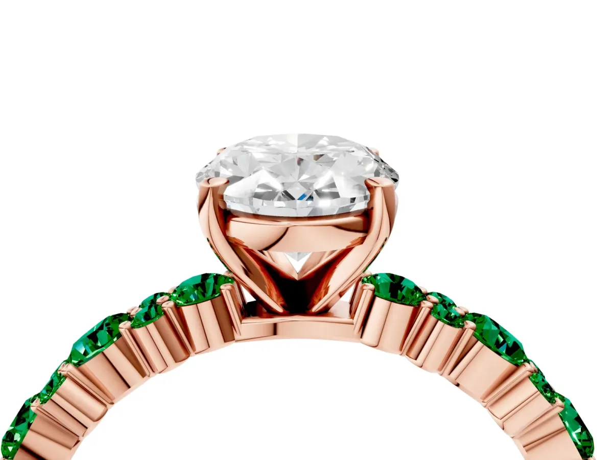 Oval Cut Diamond Side Stone Solitaire Ring with Round Emerald and Four-Prong Setting Rose gold