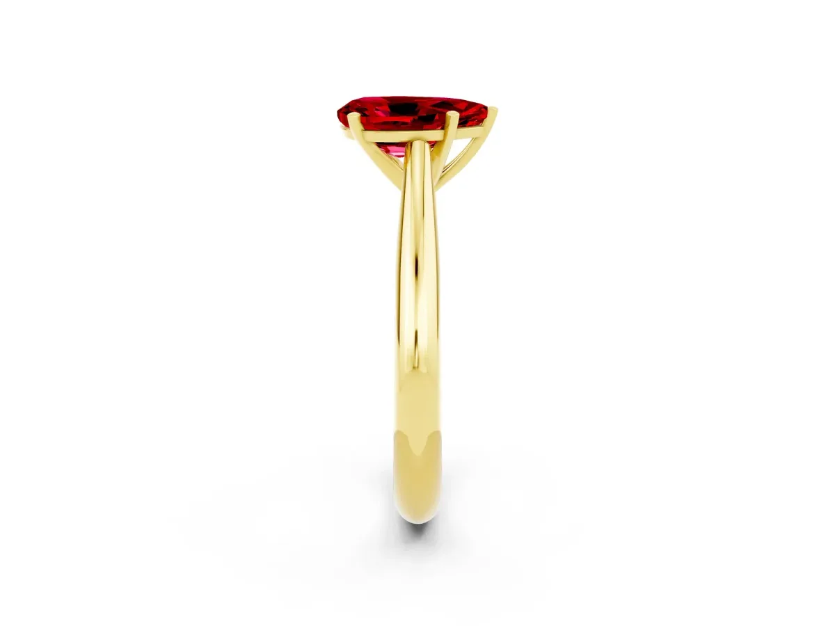Pear Cut Ruby Solitaire Engagement Ring with Cathedral Setting and Four-Prong Mount Yellow gold