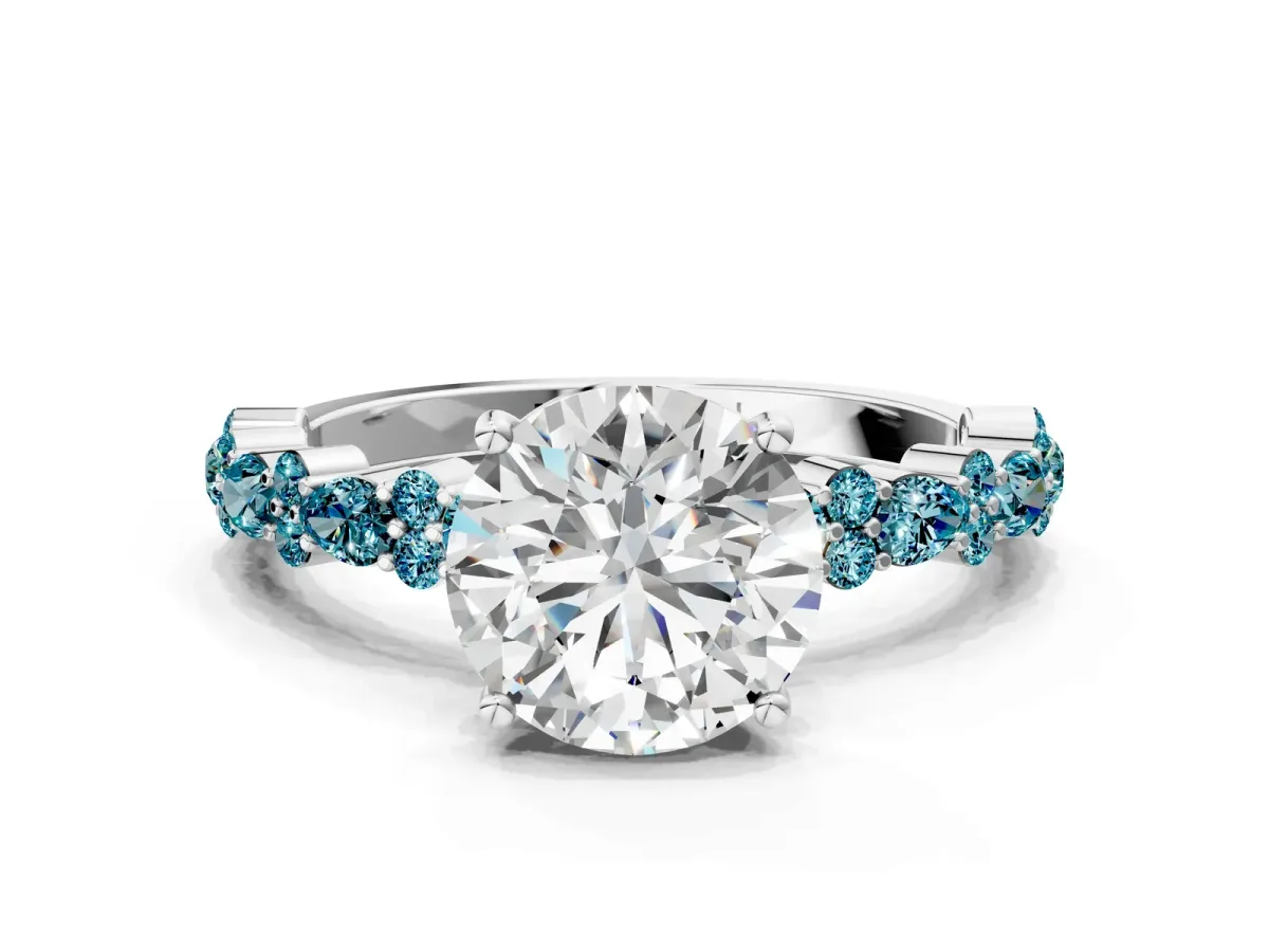 Round Cut Diamond Side Stone Solitaire Ring with Round Tanzanite and Four-Prong Setting Silver